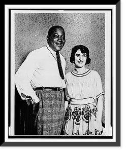 Historic Framed Print, [Jack Johnson and wife, three-quarter length portrait, facing slightly right],  17-7/8" x 21-7/8"