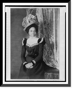 Young African American woman, three-quarter length portrait, facing slightly right, with hands folded on her lap, Historic Print