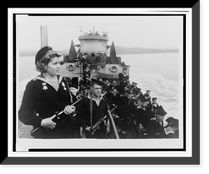 Female Soviet sailor, holding a gun, on board a ship, the decks of which are crowded with male sailors.Evgenii Khaldei, Antique Poster