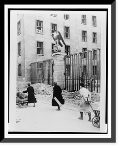 Three German women carrying belongings past the Reichsluftfahrtministerium, Berlin.Evgenii Khaldei, Antique Poster
