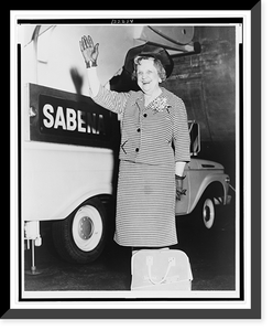 Perle Mesta, full-length portrait, standing, facing front, waving before leaving New York for Brussels, on airplane, Antique Print