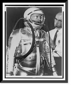 Alan B. Shepard, half-length portrait, facing right, being fitted for life-support space suit by a B.F. Goodrich technician, Vintage Poster