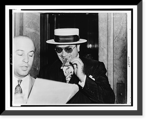 Al Capone, with a cigar and a big smile, leaving Federal building in Miami, Fla., preceded by his attorney Abe Teitelbaum, Vintage Poster