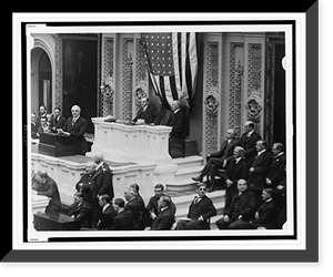 A session in the House of Representatives, with Warren Harding speaking, and Calvin Coolidge and Frederick Gillett seated behind desk Classic, Historic Print