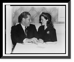 Alfred Bloomingdale, head-and-shoulders portrait, seated at table with wife Barbara Brewster, at La Martinique.Caesar Gonzalez, photographer, Vintage Wall Art