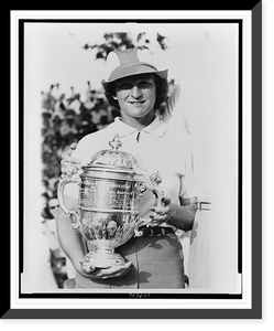 Babe Didrikson Zaharias, half-length portrait, standing, facing front, holding trophy she won in the Tam O'Shanter world" golf tournament in Chicago", Vintage Print