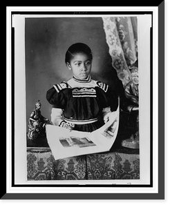 African American girl, half-length portrait, standing at table with illustrated book, facing slightly right, Antique Poster