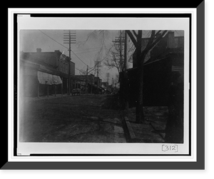 Historic Framed Print, [Street scene showing buildings and power lines in Georgia],  17-7/8" x 21-7/8"