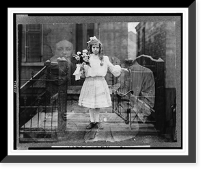 Historic Framed Print, [Double exposure spirit" photograph of girl standing,  holding flowers,  surrounded by spectral figures of three people].photograph by G.S. Smallwood,  Chicago,  Ill.",  17-7/8" x 21-7/8"