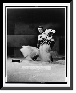 Action shot of Herb Brooks, right wing on U.S. Nationals ice hockey team, making a shot on the ice Classic, Antique Print