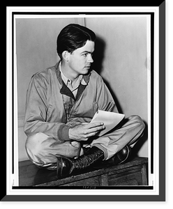 Pulitzer Prize-winning cartoonist Bill Mauldin, full-length portrait, seated, facing right, with sketch pad..World Telegram photo by Fred Palumbo, Vintage Wall Art