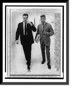Administrative assistant Chuck Stone (r) walks down a Rayburn House office building hall with Congressman Adam Clayton Powell, full-length portrait, facing front, Antique Print