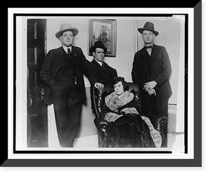 Clara Smith Hamon, seated, with standing (l to r) Sheriff Buck Garrett, Benjamin F. Harrison, and Sheriff Carl Smith in Fort Worth, Texas, where Ms. Hamon surrendered to answer murder charges Ant
