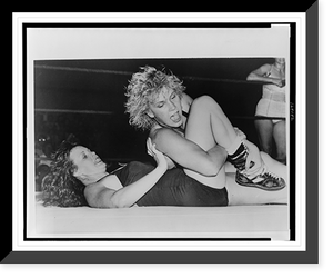 Action shot of female wrestlers Penny Banner and LeeChona La Claire competing in the ring in the first legal women's wrestling match, Chicago, Illinois Classic, Historic Reproduction