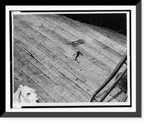 Historic Framed Print, Arrow shows blood stain on stage of Audubon ballroom where Malcolm X was shot.World Telegram & Sun photo by Stanley Wolfson.,  17-7/8" x 21-7/8"