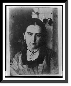 Head-and-shoulders portrait of unidentified girl, standing in front of wall, facing front, Vintage Print