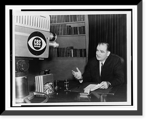 Wisconsin Senator Joseph McCarthy, head-and-shoulders portrait, seated at desk, facing slightly left, speaking in front of a CBS camera in New York's Liederkrantz Hall, Vintage Print