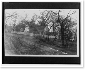 Historic Architecture - House with white picket fence partially