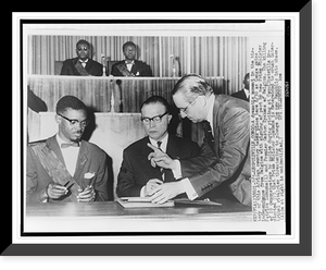 Patrice Lumumba (l) and Belgian premier Gaston Eyskens (r) both seated at the signing of the independence pact for the Congo, Vintage Print