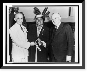 Hattie McDaniel standing between, and shaking hands with, Walter F. White and another man, Historic Print