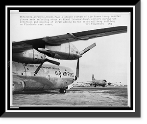 Air Force troop carrier planes making refueling stops at Miami International Airport as part of the military build-up during Cuban Missile Crisis, Antique Poster
