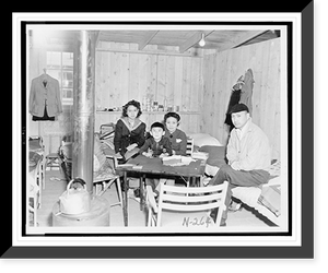 Historic Framed Print, Puyallup (Wash.) Assembly Center - family comfortably settled in apartment,  17-7/8" x 21-7/8"