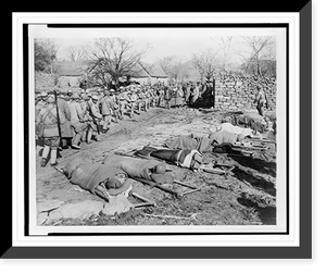 Historic Framed Print, [Chinese nationalist soldiers heading to the Su Zhou front, wounded soldiers returning from battle, and other casualties lying on stretchers in the foreground],  17-7/8" x 21-7/8"
