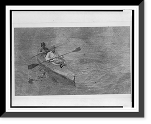 Historic Framed Print, [George and Barbara Gamow seated in kayak],  17-7/8" x 21-7/8"