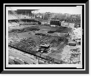 Historic Framed Print, [Demolition of Ebbets Field with crane and other equipment on field],  17-7/8" x 21-7/8"