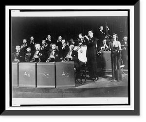 Historic Framed Print, [Artie Shaw, with clarinet, performing with his orchestra; a female vocalist is standing on the right],  17-7/8" x 21-7/8"