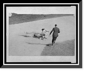 Historic Framed Print, [Umpire running to make call on man sliding into second base during baseball game],  17-7/8" x 21-7/8"