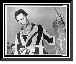 Historic Framed Print, Max Schmeling, 43-year-old former world's heavyweight champion, steps from the ring in Berlin, Germany, Nov. 1 after dropping a 10-round decision to Dick Vogt ...,  17-7/8" x 21-7/8"