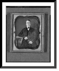 Historic Framed Print, [Unidentified man wearing spectacles, half-length portrait, seated, facing front, arm on table with tablecloth],  17-7/8" x 21-7/8"