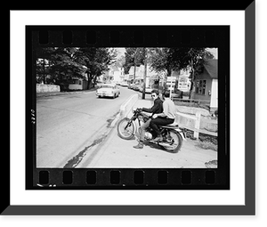 Antique City View - Bob Dylan riding on motorcycle in street