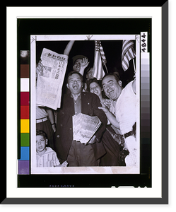 Chinese newspaper vendor, among crowd of people waving American flags in Chinatown, New York City, holds newspaper, The China Tribune, announcing surrender of the Japanese in 1945 - 2 Vintage Wal