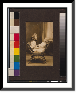Postcard addressed to Miss (Nannie Helen?) Burroughs, from Sarah Ellen, showing girl, possibly a student at the National Training School for Girls, Washington D.C., seated on chair with doll Time