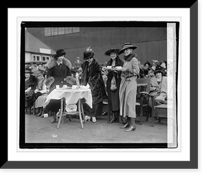 Four unidentified women standing with refreshments with audience in background, 10/25/, Vintage Poster