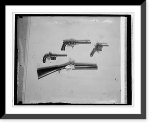 Historic Framed Print, Collection of revolvers at Natl. Museum, 3/6/26,  17-7/8" x 21-7/8"
