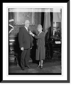 Mrs. Thos. Spence pins Mothers Day poppy on Secty. Good, 5/9/29, Vintage Print