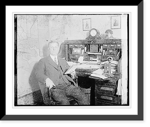 Historic Framed Print, [Unidentified man seated at desk],  17-7/8" x 21-7/8"