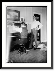 Historic Framed Print, Burke standing near piano - singing,  17-7/8" x 21-7/8"