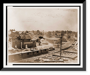 Historic Framed Print, View of Atlanta Georgia with railroad cars in left foreground,  17-7/8" x 21-7/8"