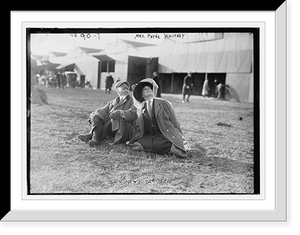 Historic Framed Print, Mrs. Payne Whitney with unidentified gentleman seated on flying field of aviation meet,  17-7/8" x 21-7/8" Historic Framed Print, Mrs. Payne Whitney with unidentified gentleman seated on flying field of aviation meet,  17-7/8" x 21-7/8"