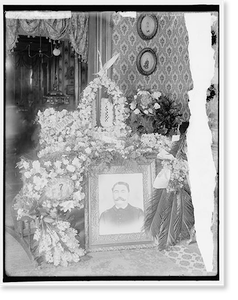 Historic Portrait - Memorial corner with wreaths surrounding portrait