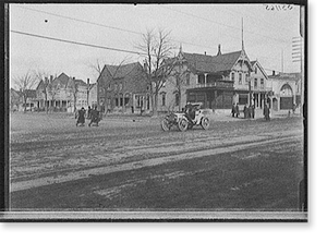 Antique City View - Street with automobile and Moesta's store