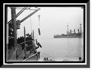 Historic Portrait - Target Practice. Hauling Torpedoes on Board