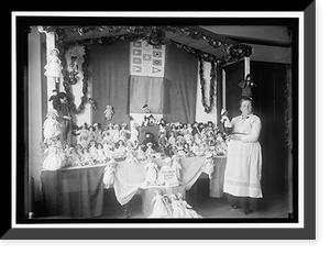Historic Framed Print, CROWN 'MOTHER' WITH EXHIBIT OF DOLLS - 2,  17-7/8" x 21-7/8"