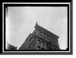 REYNOLDS, J., PERFORMING ACROBATIC AND BALANCING ACTS ON HIGH CORNICE ABOVE 9TH STREET, N.W. Classic, Vintage Print
