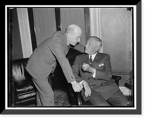 Historic Framed Print, Labor relations whispers. Washington, D.C., April 5. Senator Robert F. Wagner, (right) of New York, author of the Wagner Labor Relations Act, holds a last minute confab with Rep. William P. Connery, Jr.,,  17-7/8" x 21-7/8"