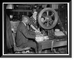 Etta Sullivan and Jimmie Jones operating the canceling machine at the Treasury Department Classic, Historic Print